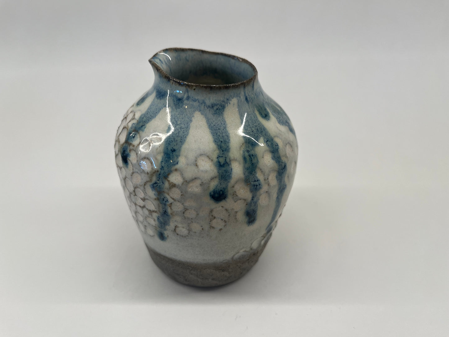 Scalloped jug vase