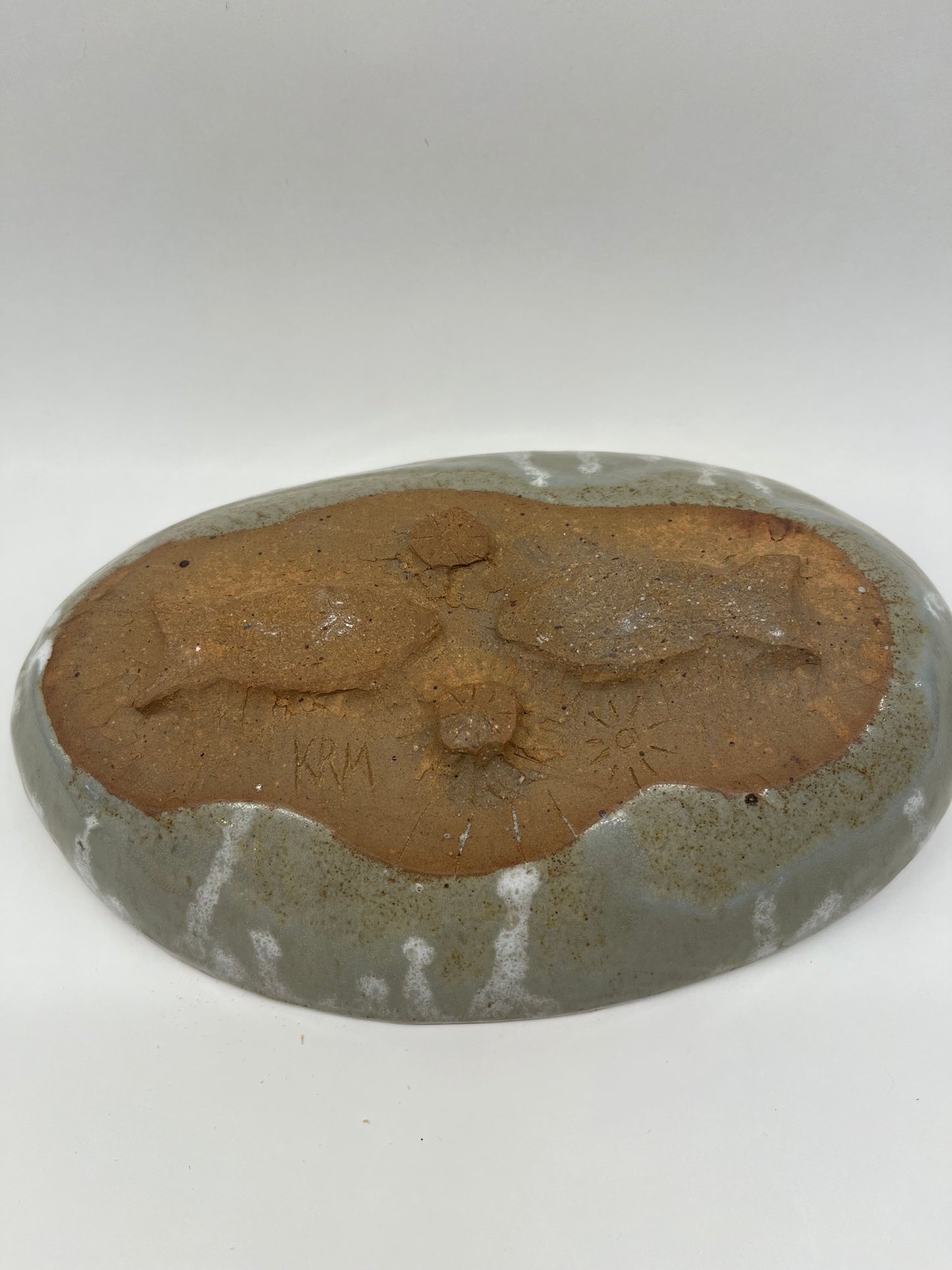 Hand built fish dish