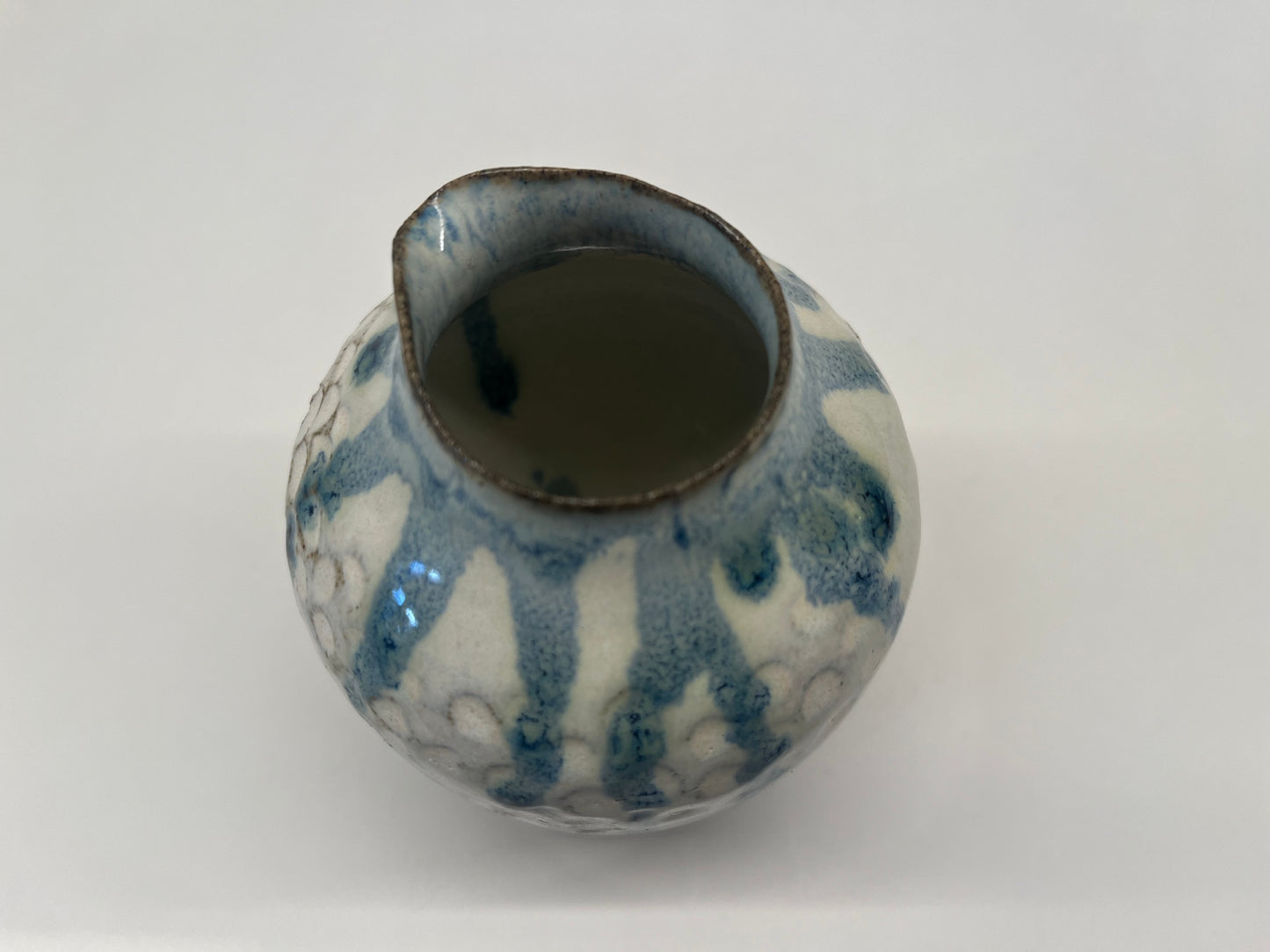 Scalloped jug vase